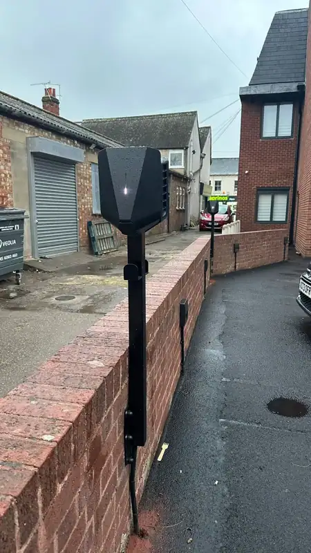 REX EV charger installed beside a property